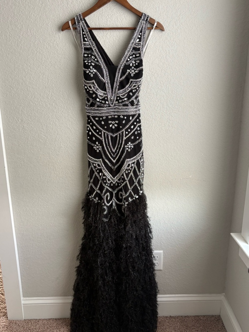 Elegant Black Beaded Black Tie Gown with Feathered Skirt